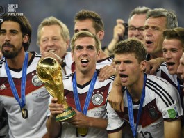Germany's Lahm holds the World Cup trophy after the 2014 World Cup final between Germany and Argentina in Rio de Janeiro